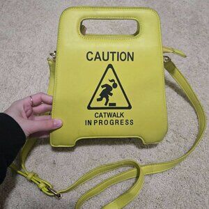 Amazon Caution Sign Catwalk in Progress Crossbody Bag
